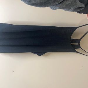 Black loose tank top with string backs
